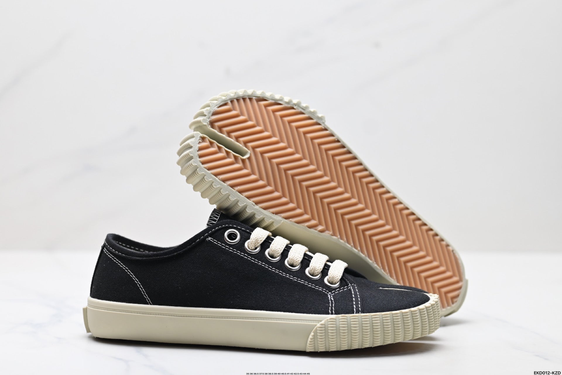 Maison Margiela Tabi Low-Top Sneaker in Black Cotton Canvas — S37WS0578P4291H0958